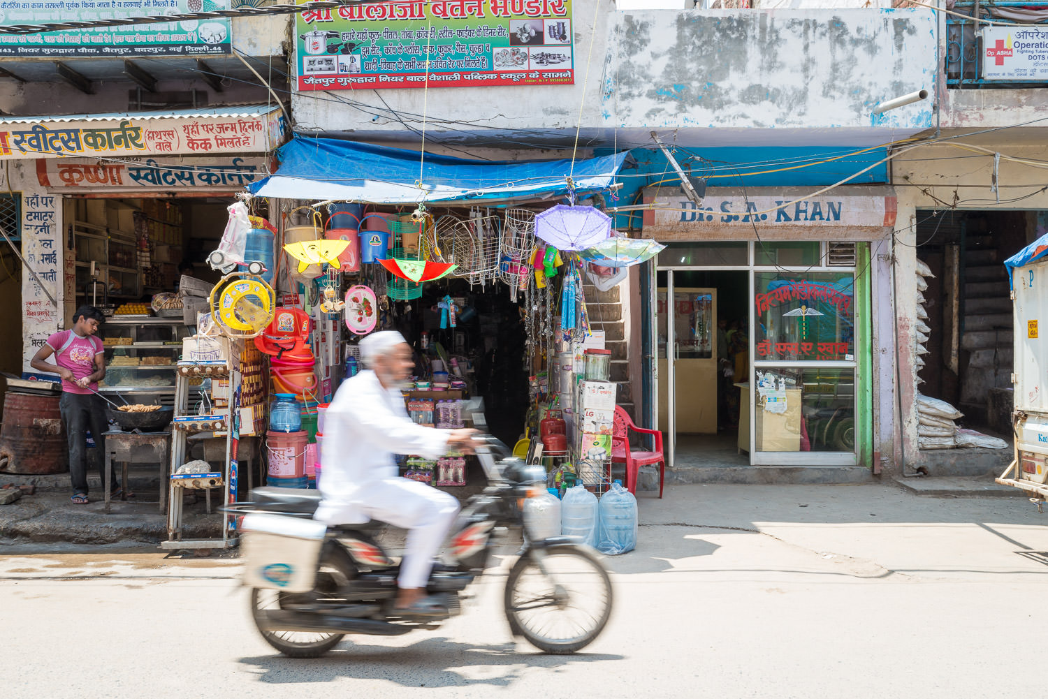 The Speed of Life and Death - Asia, India, New Delhi, clinic, health, medicine, motorcycle, street, travel, tuberculosis